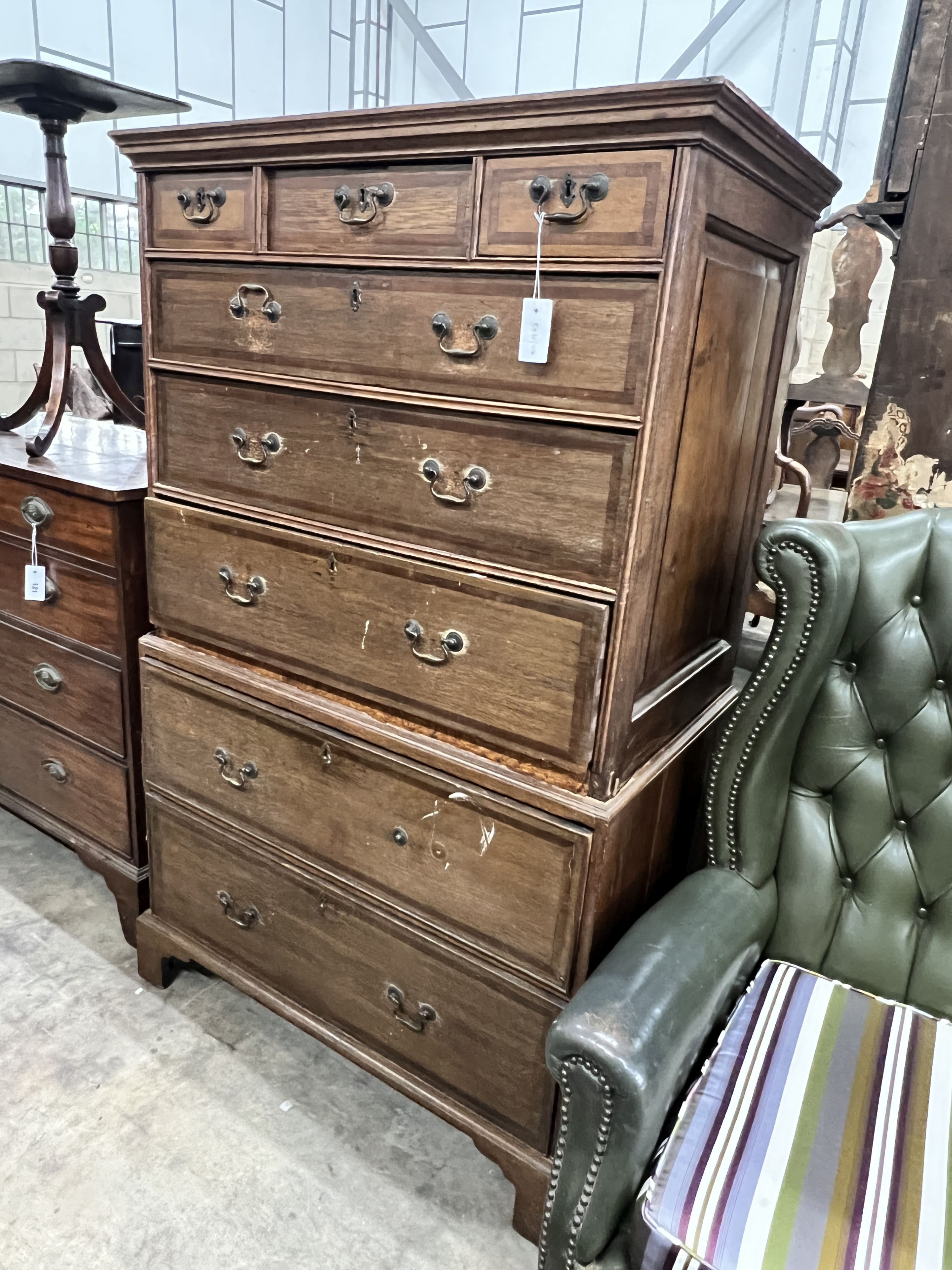 An oak chest on chest, width 97cm, depth 56cm, height 156cm